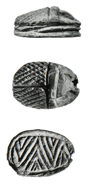 Scarab, seen from the side, from above, and from below