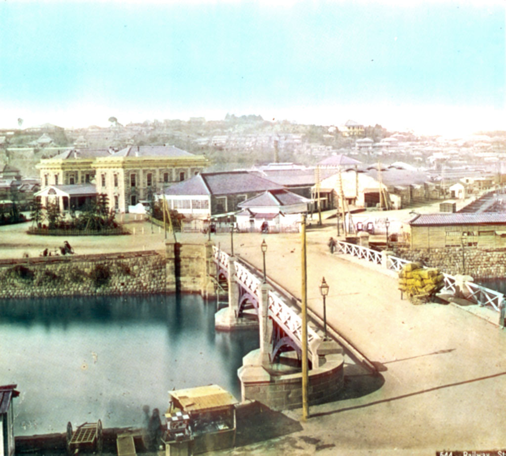 Bridge over a river, buildings in the background