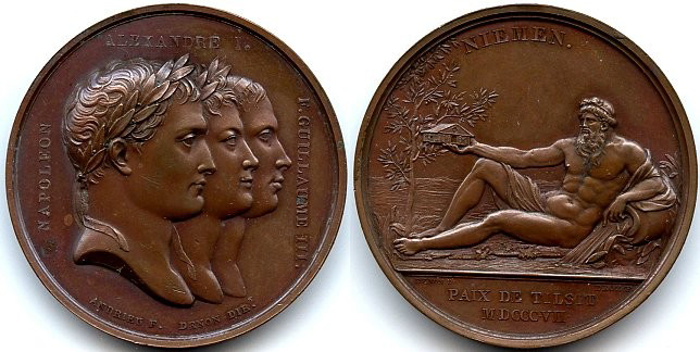 Left: bronze disc with three heads facing right; Right: bronze disc with man reclining, holding a tiny house in his extended right hand